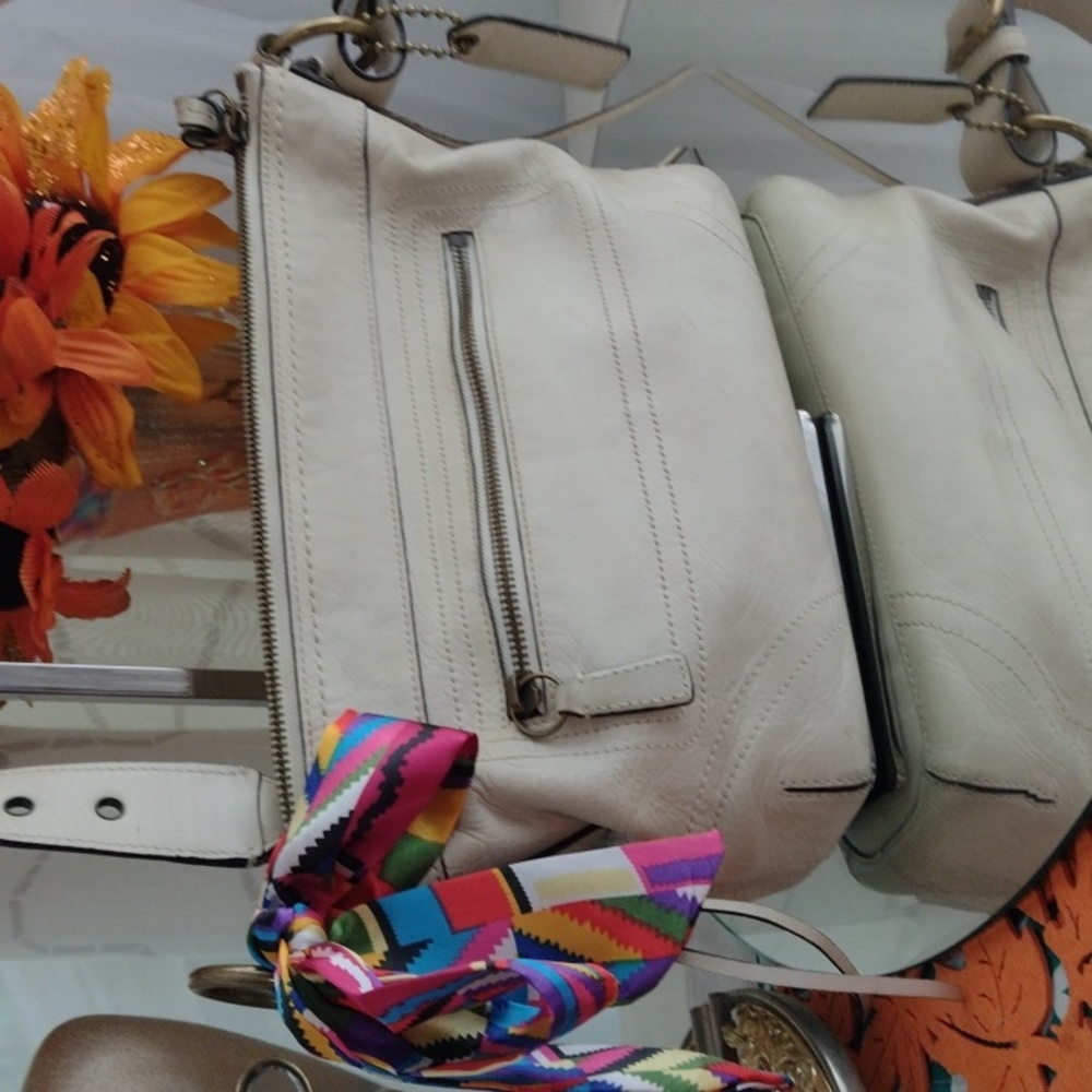 Authentic Coach leather saddle bag.